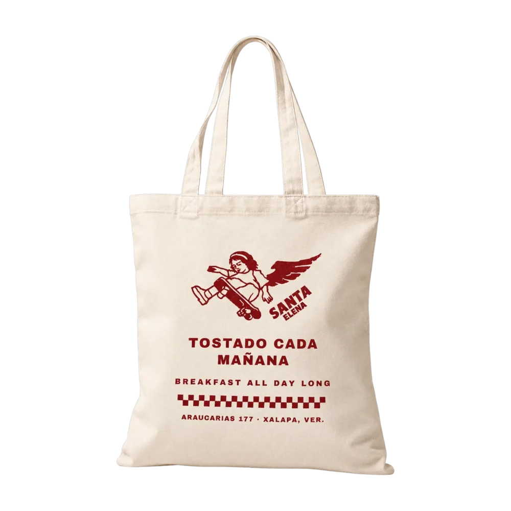Tote bag de Santa Elena en color crema, con el angel impreso en rojo