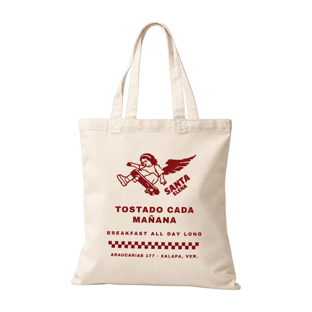 Tote bag de Santa Elena en color crema, con el angel impreso en rojo